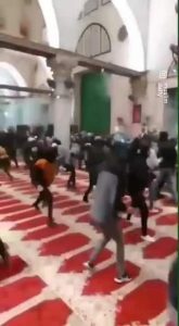 Israeli forces violating and attacking Palestinians and worshipers during the ho...