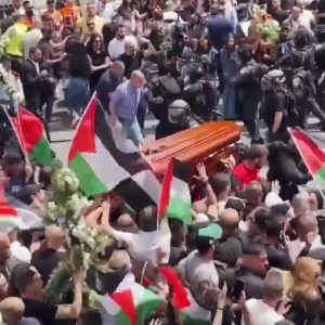 Israeli terrorist forces violently terrorising funeral procession of murdered jo…